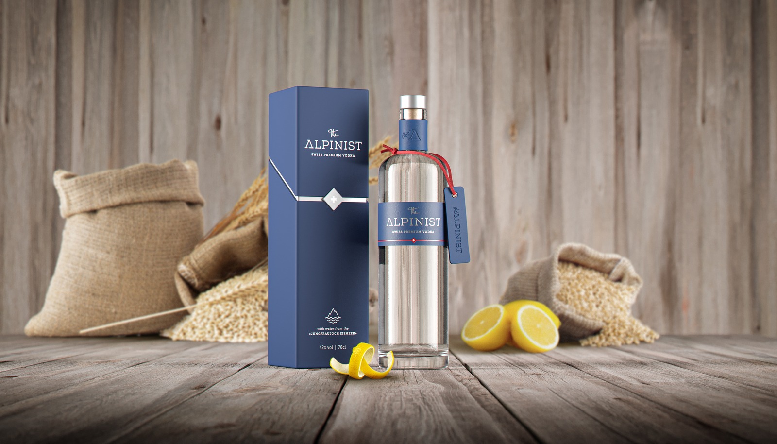 The Alpinist Gin Flasche und Verpackung mit Zitronen und Jutesäcken